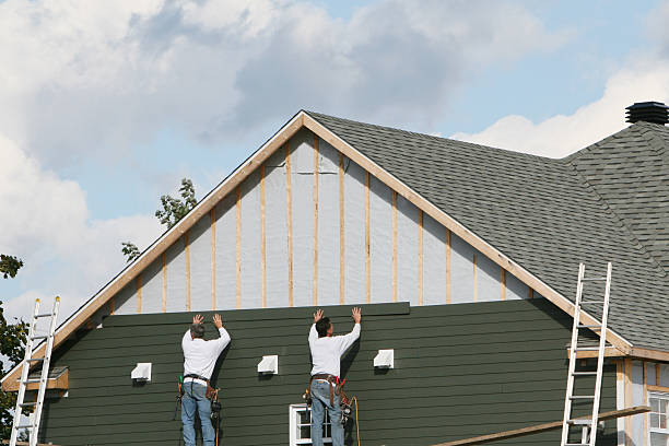 Professional Siding Contractor technician working in Mount Sinai, NY